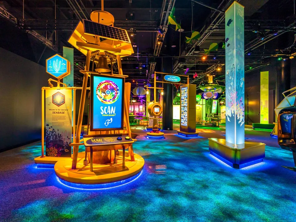 A Crayola IDEAworks station invites visitors to scan their RFID wristbands