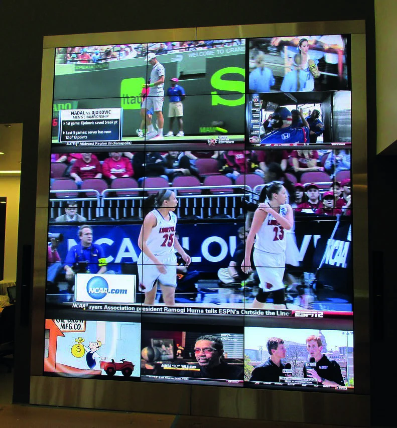 Three tall interactive display towers in the ESPN lobby
