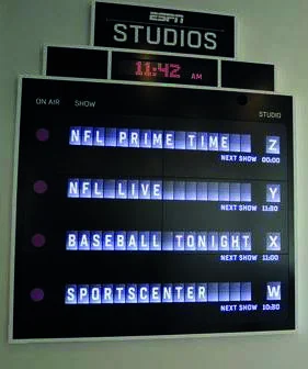 Digital split-flap-style studio scheduling display