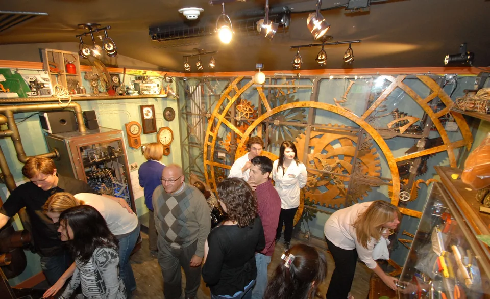 Mechanical gear wall and exhibits in Pennypickle’s Workshop