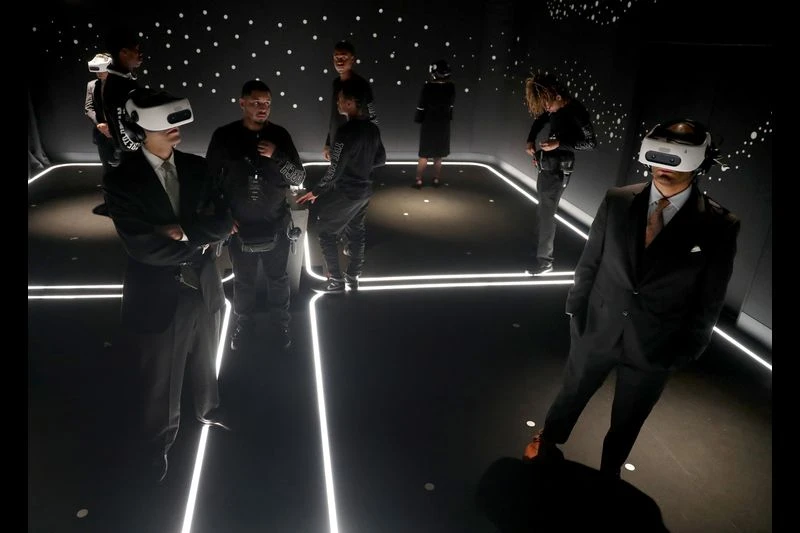 Visitors wearing virtual-reality headsets in TIME’s The March at the DuSable Museum in Chicago